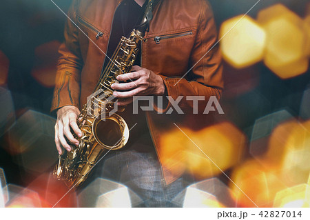 Jazz saxophone player in performance on the stage Jazz saxophone player in performance on the stage 42827014
