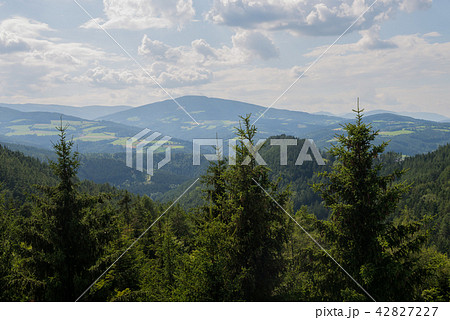 Panoramic view of idyllic mountain landscape in summer Panoramic view of idyllic mountain landscape in summer 42827227