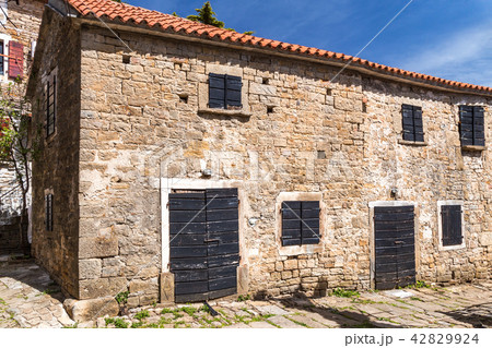 Ancient houses on a stone street in Groznjan. 42829924
