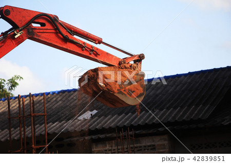 backhoe dig a ground for construction. backhoe dig a ground for construction. 42839851