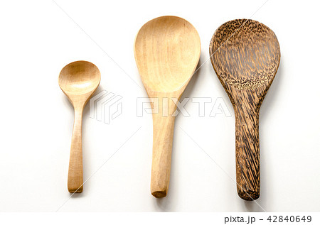 Wooden spoon and ladle on the white background 42840649
