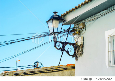 old stylish street lamp illuminating  42845282