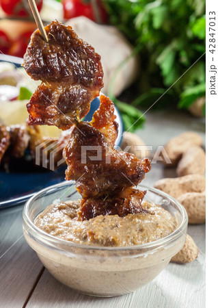 Traditional pork satay with peanut sauce Traditional pork satay with peanut sauce 42847013