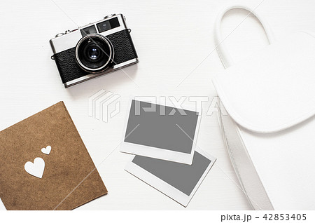 Flatlay vintage camera on wooden white background  42853405