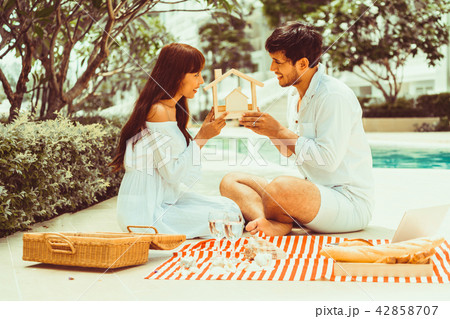 Young couple planning to buy a house concept. Young couple planning to buy a house concept. 42858707