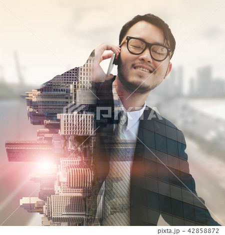 Double exposure businessman using mobile phone. Double exposure businessman using mobile phone. 42858872
