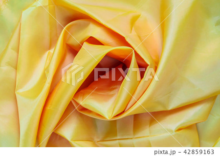 Yellow Synthetic Fabric Background 42859163