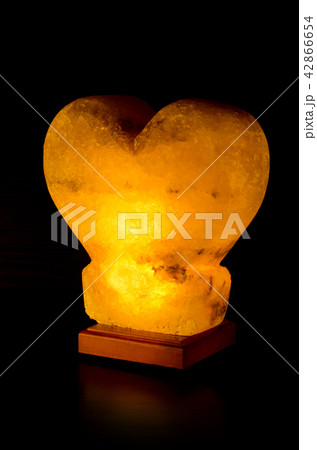 Salt lamp glowing in the form of heart Salt lamp glowing in the form of heart 42866654