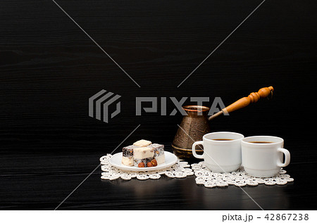 Rahat lokum and two cups of coffee Rahat lokum and two cups of coffee 42867238