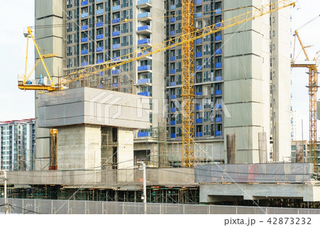industrial tower cranes withhigh raised building 42873232