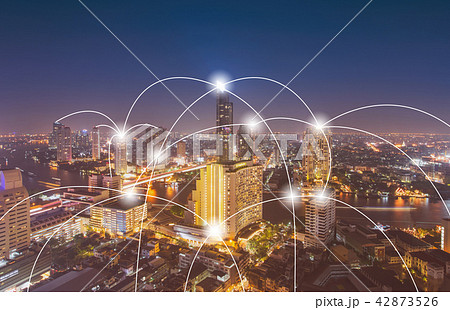 Aerial view of digital technology over cityscape. 42873526