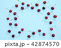 Fresh sweet cherries on blue background 42874570