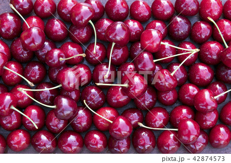 Fresh sweet cherries bowl 42874573