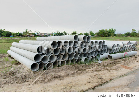 stacked of concrete, cement pipes. concrete pipes stacked of concrete, cement pipes. concrete pipes 42878967
