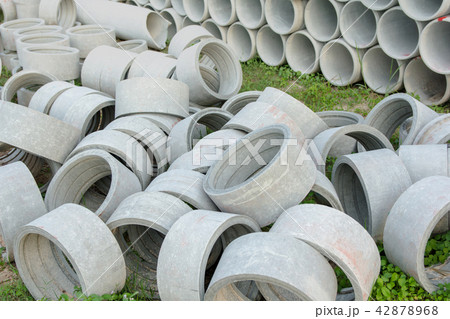 stacked of concrete, cement pipes. concrete pipes stacked of concrete, cement pipes. concrete pipes 42878968