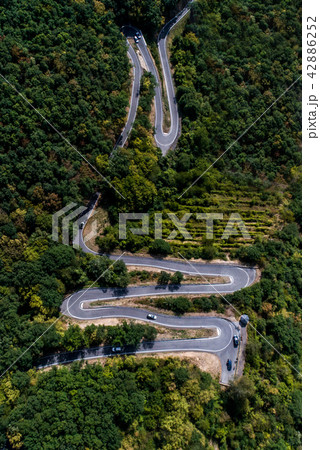 Winding road serpentine from a high mountain pass in the mosel village Brodenbach Germany Aerial 42886252