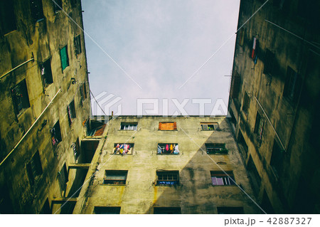 Square windows in condemned building. No people 42887327