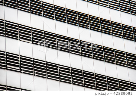 Detail of a white garage building 42889093