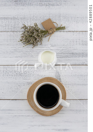 A cup of coffee and milk with caspia bouquet 42889501