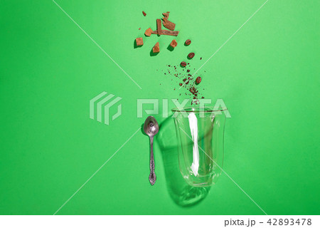 cappuccino glass cup with sugar and coffee beans 42893478