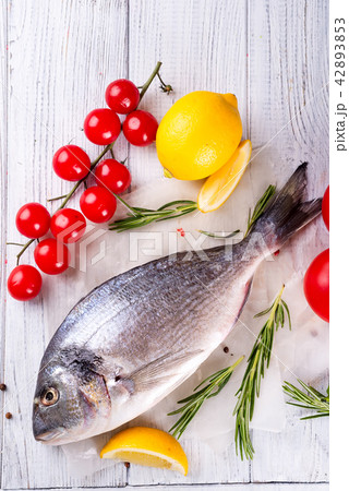 Fresh uncooked dorado or sea bream fish Fresh uncooked dorado or sea bream fish 42893853