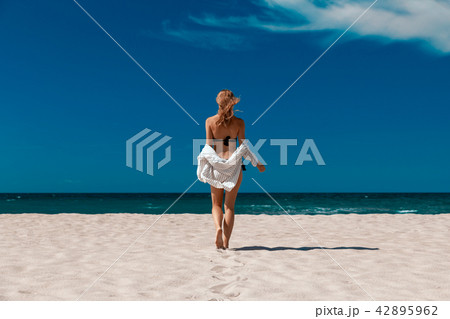 woman on sea beach woman on sea beach 42895962