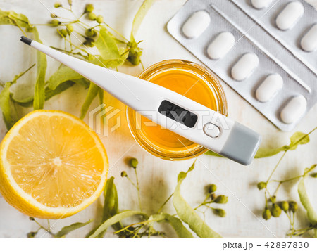Electric thermometer, pills, lemon. Concept of prevention of colds 42897830