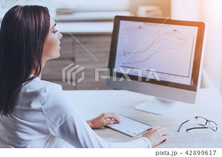 Happy Business Lady Using Computer in Office. Happy Business Lady Using Computer in Office. 42899617