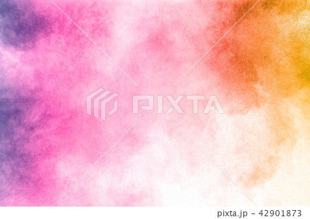 abstract color powder explosion on white. 42901873