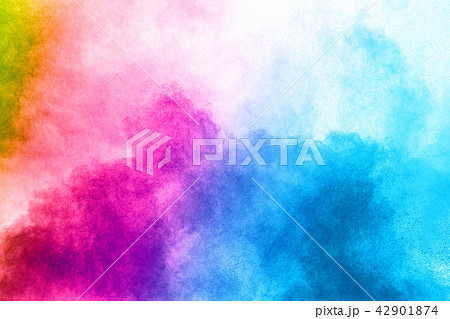 abstract color powder explosion on white. 42901874
