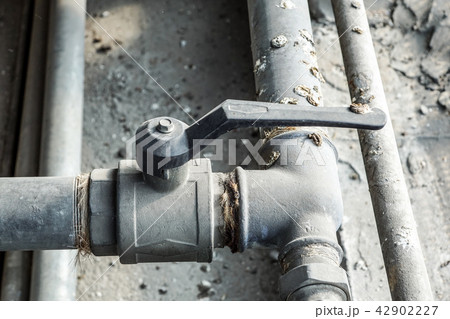 pipe off the water supply, both old rust corrosion 42902227