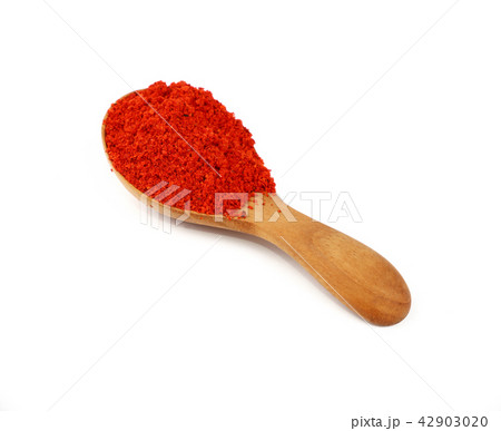 Wooden scoop spoon full of red hot chili pepper Wooden scoop spoon full of red hot chili pepper 42903020