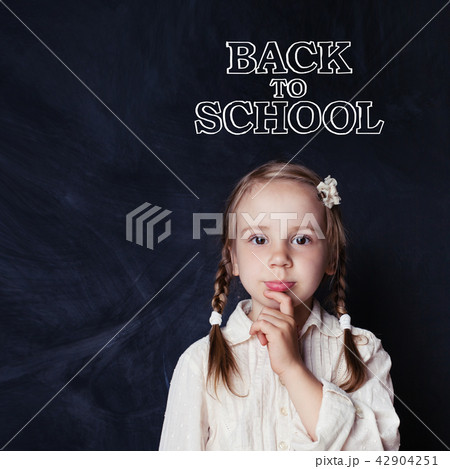 Little girl student thinking in classroom Little girl student thinking in classroom 42904251