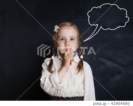 Thinking girl against speech clouds chalk drawing Thinking girl against speech clouds chalk drawing 42904680