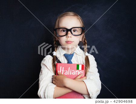 child girl with book in Italian language school child girl with book in Italian language school 42904698