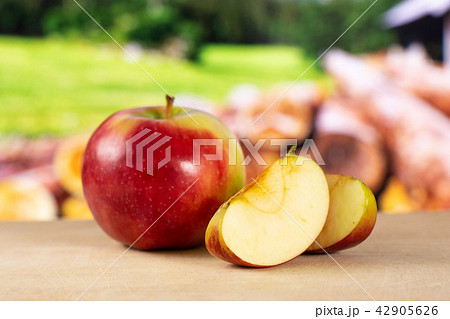 Fresh red apple james grieve with country nature 42905626