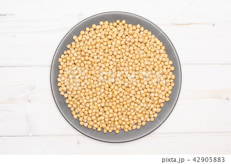 Raw chickpeas kabuli on grey wood 42905883