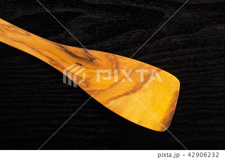 Kitchen tool on black wood 42906232