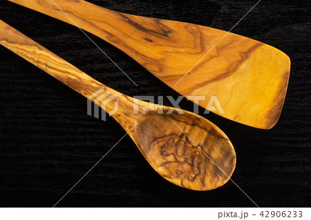 Kitchen tool on black wood 42906233