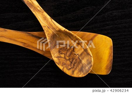 Kitchen tool on black wood 42906234