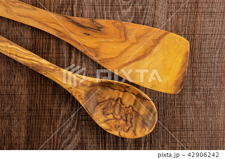 Kitchen tool on brown wood 42906242