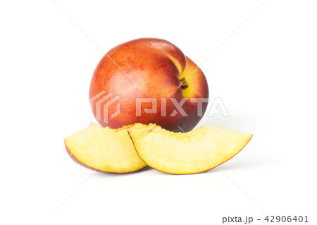 Ripe deep red nectarine isolated on white Ripe deep red nectarine isolated on white 42906401