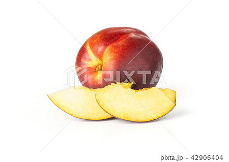 Ripe deep red nectarine isolated on white Ripe deep red nectarine isolated on white 42906404
