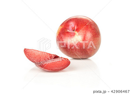 Fresh pluot interspecific plums isolated on white Fresh pluot interspecific plums isolated on white 42906467