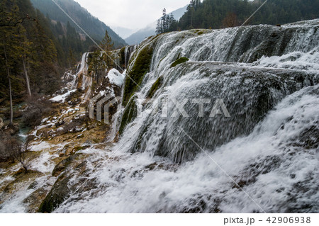 Waterfall from a cliff in the forest 42906938