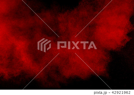 Abstract red powder explosion on dark background. Abstract red powder explosion on dark background. 42921962