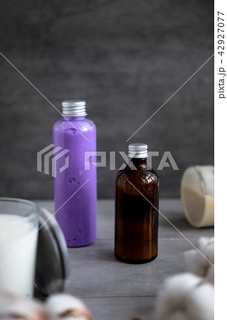 Bottles with natural spa cosmetic products Bottles with natural spa cosmetic products 42927077