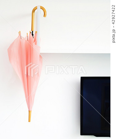 umbrella keep on shelf and white wall umbrella keep on shelf and white wall 42927422