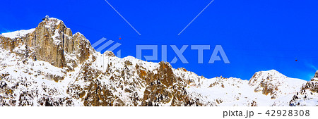 Ski background with cable car and snow mountains 42928308