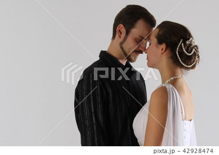 man and woman kissing on white background man and woman kissing on white background 42928474